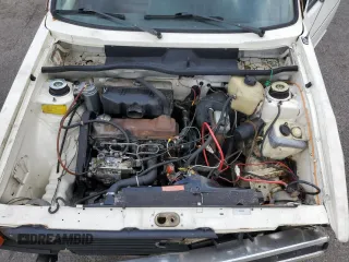 1981 Volkswagen Rabbit z VIN 1VWFG0179BV177022, wystawiony jako Copart lot #65369204 z przebiegiem 168 444 mil mil oraz Szkody całkowita. Historia ofert i sprzedaży dostępna na DreamBid. Obrazek 11.