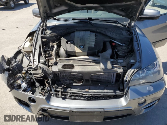 2012 BMW X5 35d with VIN 5UXZW0C58C0B88267, listed as a Copart auction lot 54160615 with Not provided miles and Salvage title. Bid and sale history available at DreamBid. Image 12.