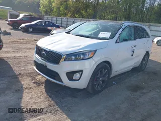 2016 Kia Sorento SX with VIN 5XYPKDA51GG072940, listed as a IAAI auction lot 42017504 with 110,897 mi miles. Bid and sale history available at carsss.com. Image 2.
