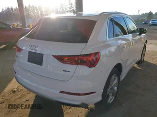 2021 Audi Q3 Premium with VIN WA1AUCF37M1087692, listed as a IAAI auction lot 41277380 with 66,039 mi miles and . Bid and sale history available at DreamBid. Image 4.