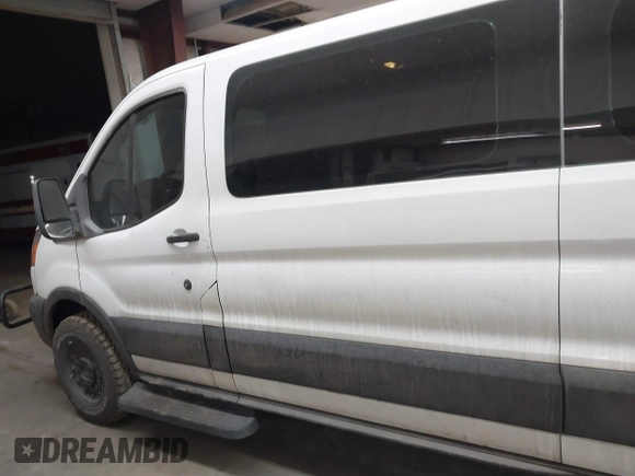 2019 Ford Transit Passenger XL with VIN 1FBZX2YM6KKA75786, listed as a IAAI auction lot 41712050 with 120,238 mi miles and . Bid and sale history available at DreamBid. Image 14.