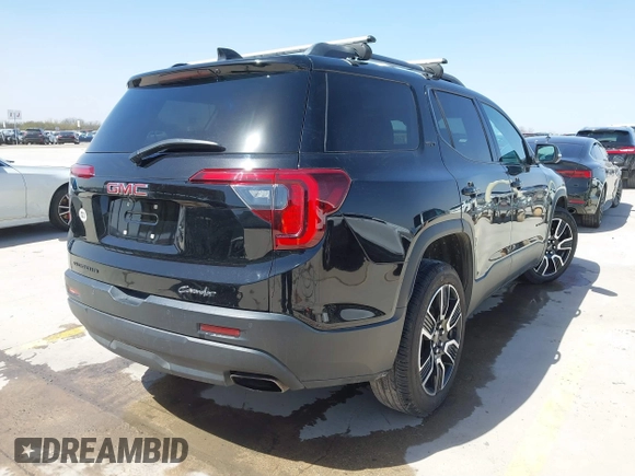 2021 GMC Acadia SLT with VIN 1GKKNMLS7MZ204928, listed as a IAAI auction lot 41719245 with 76,825 mi miles. Bid and sale history available at carsss.com. Image 4.