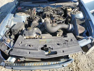 2005 Ford Mustang Deluxe с VIN 1ZVFT84N155227663, выставлен на аукционе Copart как лот 57402915 с пробегом 184 817 миль миль и Списание • Salvage title. История ставок и продаж доступна на DreamBid. Изображение 11.
