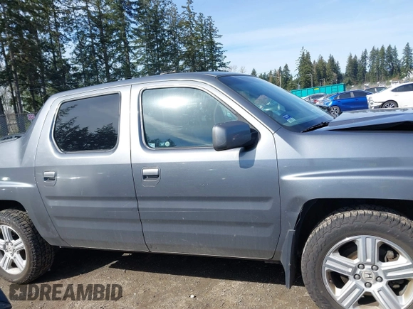 2009 Honda Ridgeline RTL with VIN 5FPYK16599B100707, listed as a IAAI auction lot 41877598 with 130,622 mi miles and . Bid and sale history available at DreamBid. Image 13.