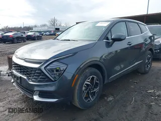 2024 Kia Sportage LX with VIN KNDPUCDFXR7308560, listed as a IAAI auction lot 41639527 with 27,371 mi miles and . Bid and sale history available at DreamBid. Image 2.