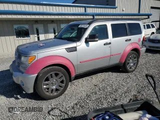 2010 Dodge Nitro SXT z VIN 1D4PT5GKXAW108802, wystawiony jako Copart lot #80215434 z przebiegiem 225 908 mil mil oraz Szkody całkowita. Historia ofert i sprzedaży dostępna na DreamBid. Obrazek 1.