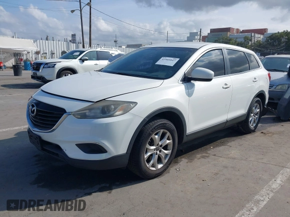 2015 Mazda CX-9 Sport with VIN JM3TB2BAXF0453244, listed as a IAAI auction lot 41905847 with 128,764 mi miles and . Bid and sale history available at carsss.com. Image 17.