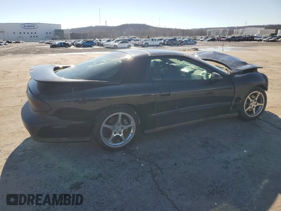 2001 Pontiac Firebird Formula with VIN 2G2FV22GX12107045, listed as a Copart auction lot 88646235 with 165,488 mi miles and Salvage title. Bid and sale history available at DreamBid. Image 3.