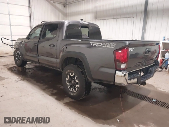 2019 Toyota Tacoma SR with VIN 5TFCZ5AN7KX208672, listed as a IAAI auction lot 42143071 with 83,584 mi miles and . Bid and sale history available at DreamBid. Image 3.