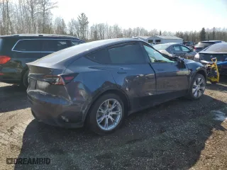 2023 Tesla Model Y Long Range with VIN LRWYGDEE4PC137054, listed as a Copart auction lot 48340895 with 0 mi miles and Non Repairable. Bid and sale history available at carsss.com. Image 3.