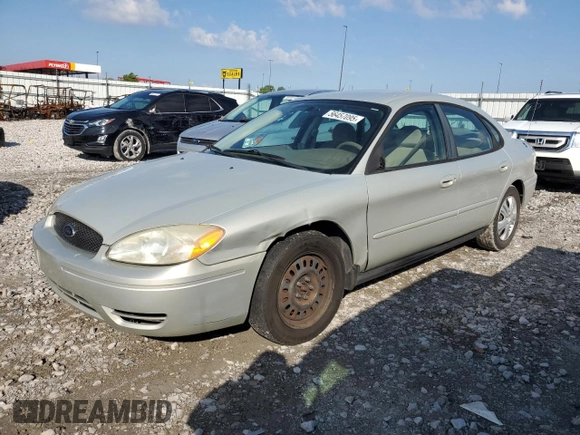 2005 Ford Taurus SE with VIN 1FAFP53U95A101336, listed as a Copart auction lot 56457095 with 127,656 mi miles and Salvage title. Bid and sale history available at DreamBid. Image 1.