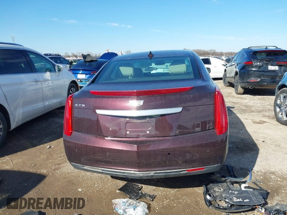 2017 Cadillac XTS with VIN 2G61L5S31H9164023, listed as a IAAI auction lot 41408290 with 59,695 mi miles and . Bid and sale history available at DreamBid. Image 16.