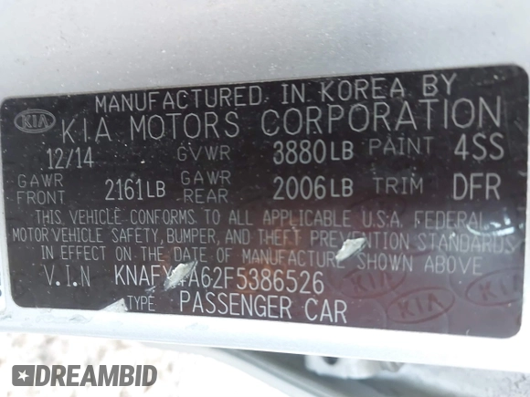2015 Kia Forte LX with VIN KNAFX4A62F5386526, listed as a IAAI auction lot 41800783 with 124,553 mi miles. Bid and sale history available at carsss.com. Image 9.