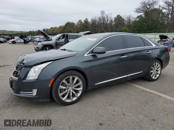 2016 Cadillac XTS Luxury Collection with VIN 2G61N5S34G9120168, listed as a Copart auction lot 61776225 with 83,721 mi miles and Salvage title. Bid and sale history available at DreamBid. Image 1.