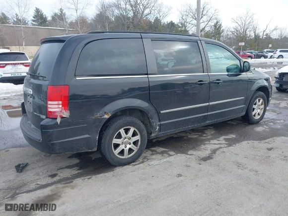 2010 Chrysler Town & Country Touring with VIN 2A4RR5D17AR293118, listed as a IAAI auction lot 41650474 with 136,969 mi miles. Bid and sale history available at carsss.com. Image 4.