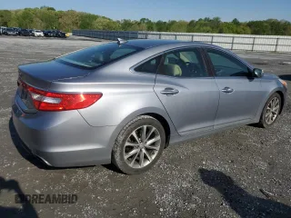 2015 Hyundai Azera z VIN KMHFG4JGXFA483472, wystawiony jako Copart lot #52216745 z przebiegiem 130 758 mil mil oraz Szkoda całkowita • Salvage title. Historia ofert i sprzedaży dostępna na DreamBid. Obrazek 3.