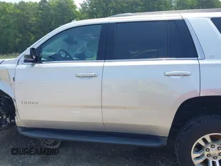2019 Chevrolet Tahoe LT with VIN 1GNSKBKC8KR363433, listed as a IAAI auction lot 42567045 with 122,956 mi miles and . Bid and sale history available at DreamBid. Image 14.