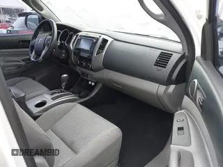 2014 Toyota Tacoma PreRunner with VIN 3TMJU4GNXEM172008, listed as a IAAI auction lot 42427701 with 164,987 mi miles and . Bid and sale history available at DreamBid. Image 5.
