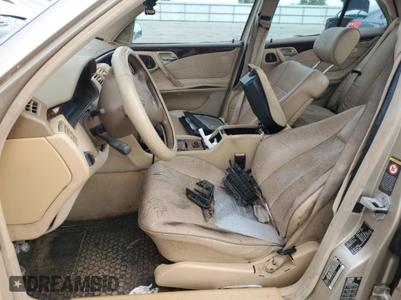 2001 Mercedes-Benz E-Class with VIN WDBJF70JX1B194075, listed as a Copart auction lot 70482944 with 218,319 mi miles and Salvage Title. Bid and sale history available at carsss.com. Image 7.