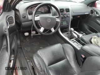2006 Pontiac GTO z VIN 6G2VX12U66L564449, wystawiony jako Copart lot #71022094 z przebiegiem 179 964 mil mil oraz Szkody całkowita. Historia ofert i sprzedaży dostępna na DreamBid. Obrazek 8.