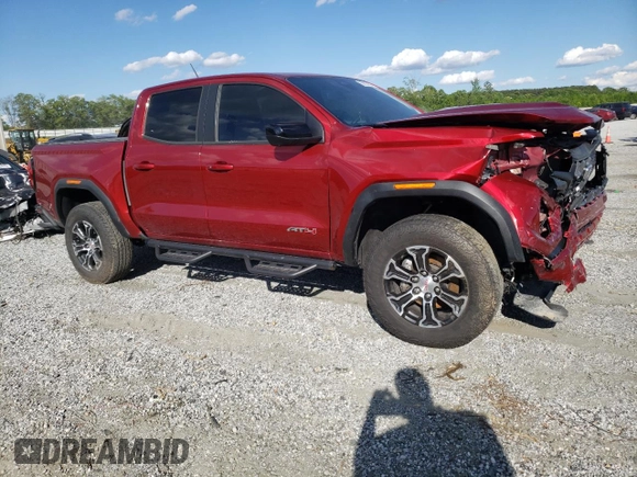 2024 GMC Canyon 4WD AT4 with VIN 1GTP6DEK3R1149427, listed as a Copart auction lot 55827855 with 12,411 mi miles and Salvage Title. Bid and sale history available at carsss.com. Image 4.