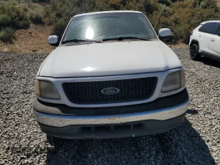 2001 Ford F-150 XL with VIN 1FTZX17251NB12930, listed as a Copart auction lot 62517295 with Not provided miles and Salvage title. Bid and sale history available at DreamBid. Image 5.