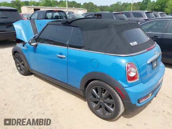 2013 MINI Convertible S with VIN WMWZP3C53DT705016, listed as a IAAI auction lot 42155802 with Not provided miles and . Bid and sale history available at DreamBid. Image 3.