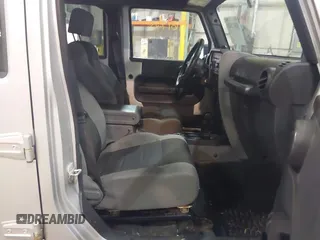 2007 Jeep Wrangler Unlimited X with VIN 1J4GA39167L147516, listed as a IAAI auction lot 41617025 with 119,572 mi miles and . Bid and sale history available at DreamBid. Image 5.