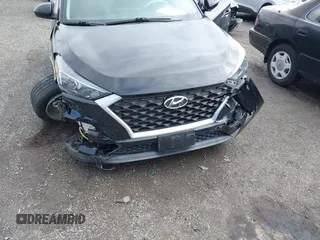 2019 Hyundai Tucson SE with VIN KM8J2CA46KU977863, listed as a IAAI auction lot 41704318 with 23,076 mi miles. Bid and sale history available at carsss.com. Image 17.