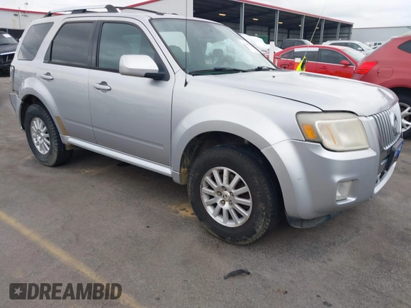 2010 Mercury Mariner Premier z VIN 4M2CN8H71AKJ14877, wystawiony jako IAAI lot #41609202 z przebiegiem 232 706 mil mil oraz . Historia ofert i sprzedaży dostępna na DreamBid. Obrazek 1.