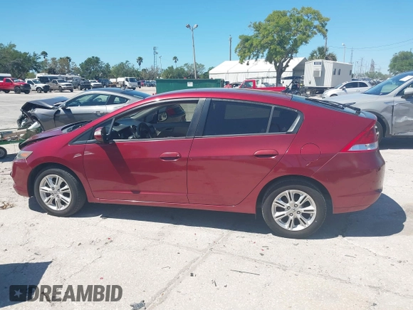 2010 Honda Insight EX with VIN JHMZE2H71AS021062, listed as a IAAI auction lot 41857350 with 45,558 mi miles and . Bid and sale history available at carsss.com. Image 15.