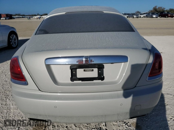 2015 Rolls-Royce Wraith z VIN SCA665C52FUX85269, wystawiony jako Copart lot #77326374 z przebiegiem Nie podano mil oraz Szkody całkowita. Historia ofert i sprzedaży dostępna na DreamBid. Obrazek 6.