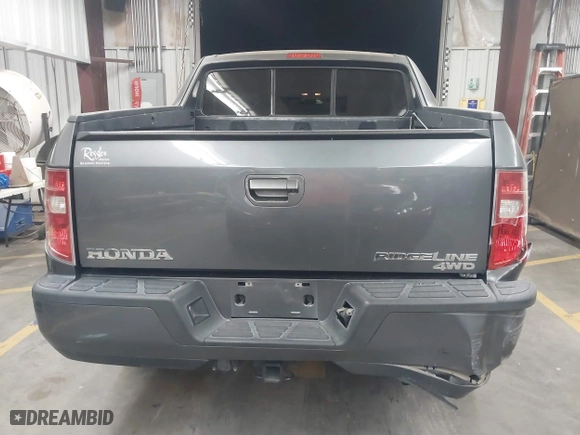 2011 Honda Ridgeline RTL with VIN 5FPYK1F57BB004189, listed as a IAAI auction lot 41871741 with 193,913 mi miles. Bid and sale history available at carsss.com. Image 16.