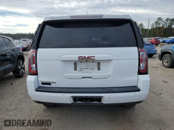 2015 GMC Yukon SLE with VIN 1GKS2AKCXFR744083, listed as a Copart auction lot 82003234 with 150,926 mi miles and Salvage Title. Bid and sale history available at carsss.com. Image 6.
