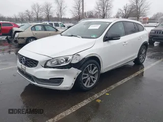 2015 Volvo V60 Cross Country T5 with VIN YV4612HK1F1001764, listed as a IAAI auction lot 41560997 with 69,888 mi miles. Bid and sale history available at carsss.com. Image 2.
