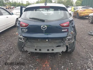 2019 Mazda CX-3 Touring z VIN JM1DKFC76K0446440, wystawiony jako IAAI lot #42314401 z przebiegiem 57 901 mil mil oraz . Historia ofert i sprzedaży dostępna na DreamBid. Obrazek 17.
