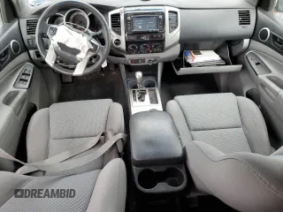 2014 Toyota Tacoma with VIN 5TFLU4EN7EX106909, listed as a Copart auction lot 46906235 with 102,681 mi miles and Salvage Title. Bid and sale history available at DreamBid. Image 8.