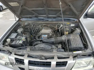 2004 Isuzu Rodeo S with VIN 4S2CK58W344311048, listed as a Copart auction lot 45154765 with 128,733 mi miles and Clean Title. Bid and sale history available at DreamBid. Image 12.