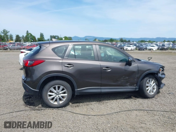 2016 Mazda CX-5 Sport with VIN JM3KE4BY8G0785812, listed as a IAAI auction lot 42324083 with 57,405 mi miles and . Bid and sale history available at DreamBid. Image 13.