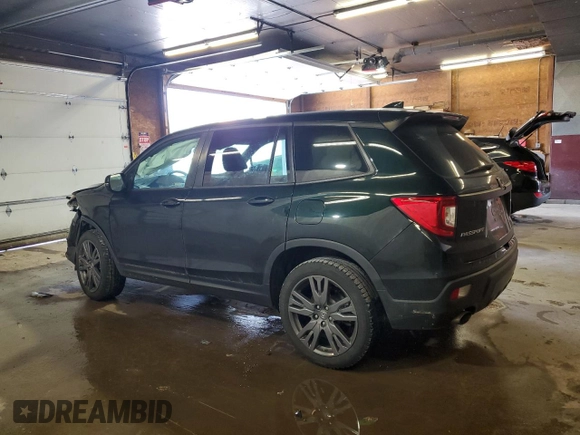 2020 Honda Passport EX-L with VIN 5FNYF8H57LB011549, listed as a Copart auction lot 59123735 with 127,797 mi miles and Salvage title. Bid and sale history available at DreamBid. Image 2.