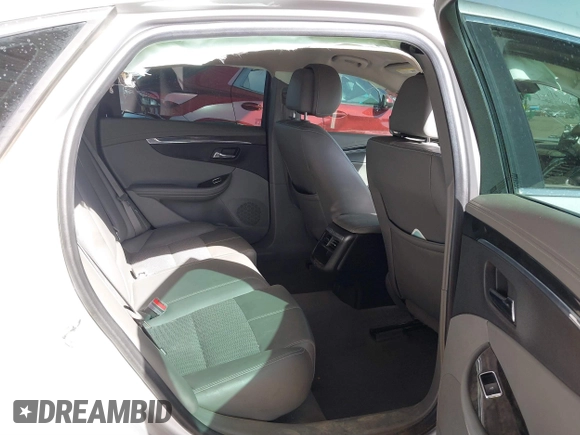 2014 Chevrolet Impala LT with VIN 1G1115SL6EU105818, listed as a IAAI auction lot 41678040 with 139,686 mi miles and . Bid and sale history available at DreamBid. Image 8.