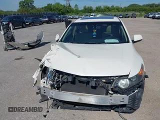 2009 Acura TSX with VIN JH4CU26619C010409, listed as a IAAI auction lot 39634371 with 76,758 mi miles. Bid and sale history available at carsss.com. Image 13.