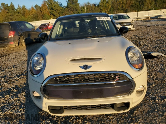 2017 MINI Hardtop 4 Door Cooper S z VIN WMWXU3C37H2F48913, wystawiony jako Copart lot #80697114 z przebiegiem 48 397 mil mil oraz Szkody całkowita. Historia ofert i sprzedaży dostępna na DreamBid. Obrazek 5.