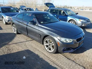 2015 BMW 4 Series 428i xDrive with VIN WBA3N5C58FK484738, listed as a IAAI auction lot 41772870 with 175,510 mi miles. Bid and sale history available at carsss.com. Image 1.