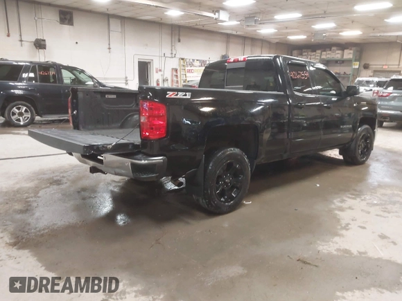 2015 Chevrolet Silverado 1500 LT with VIN 1GCVKREC2FZ417244, listed as a IAAI auction lot 41267554 with 87,735 mi miles and . Bid and sale history available at DreamBid. Image 4.