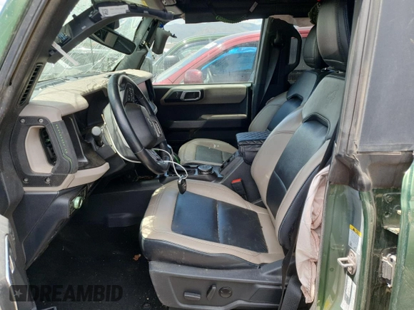 2022 Ford Bronco с VIN 1FMEE5DP0NLA72491, выставлен на аукционе Copart как лот 62482815 с пробегом 80 184 миль миль и Списание • Salvage title. История ставок и продаж доступна на DreamBid. Изображение 7.