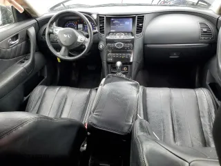 2014 Infiniti QX70 with VIN JN8CS1MW0EM413360, listed as a Copart auction lot 56853934 with 242,661 mi miles and Clean Title. Bid and sale history available at carsss.com. Image 8.