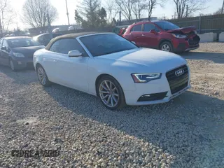 2015 Audi A5 Premium z VIN WAUCFAFH1FN007398, wystawiony jako IAAI lot #41987501 z przebiegiem 160 428 mil mil oraz . Historia ofert i sprzedaży dostępna na DreamBid. Obrazek 1.