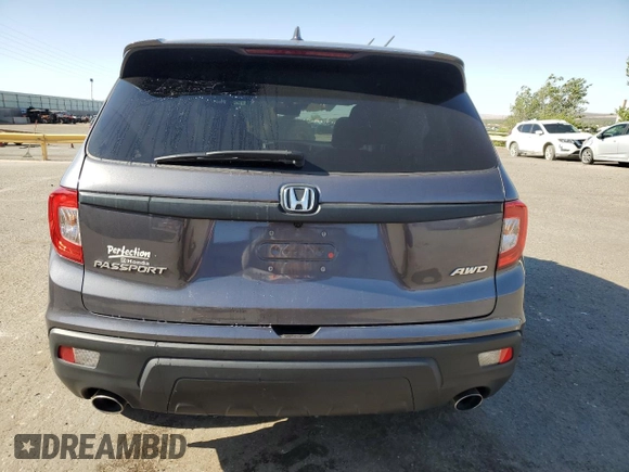 2021 Honda Passport EX-L z VIN 5FNYF8H56MB032247, wystawiony jako Copart lot #54862895 z przebiegiem 64 941 mil mil oraz Szkoda całkowita • Salvage title. Historia ofert i sprzedaży dostępna na DreamBid. Obrazek 6.
