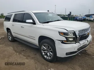 2015 Chevrolet Suburban LT z VIN 1GNSKJKC5FR261474, wystawiony jako Copart lot #60679775 z przebiegiem 128 851 mil mil oraz Czysty tytuł • Clean title. Historia ofert i sprzedaży dostępna na DreamBid. Obrazek 4.